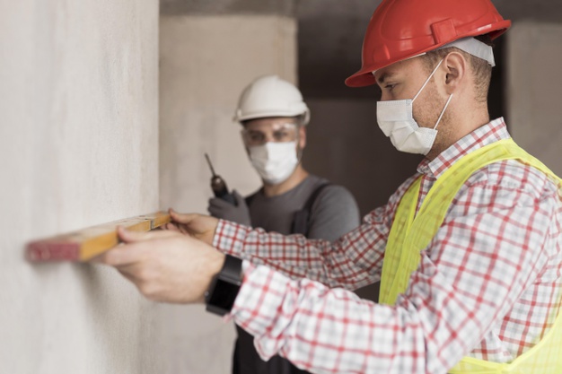 side view men working with masks 23 2148751983