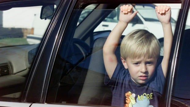 child in car