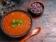 classic tomato soup brown bowl beans spoon mixed color table
