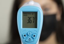 close up photo thermometer nurse checking temperature Custom
