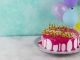 cake with glaze candles high angle Custom