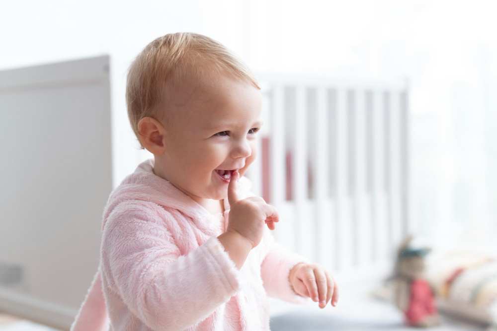 cute baby girl smiling her nursery