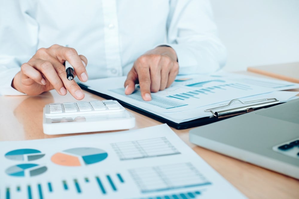 finances saveing economy concept female accountant banker use calculator