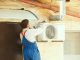 hvac technician working capacitor part condensing unit