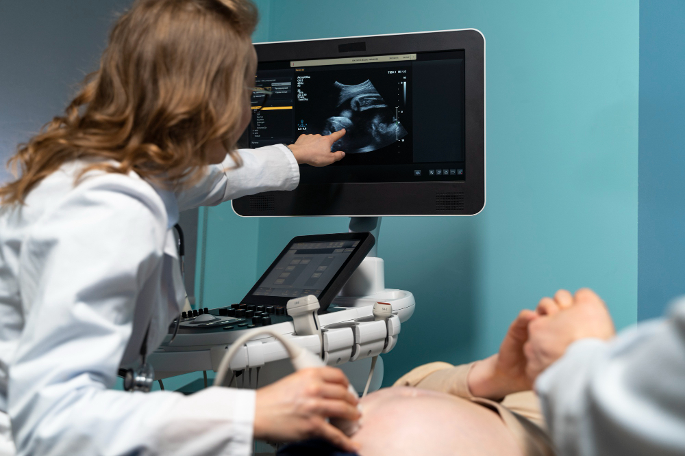 gynecologist performing ultrasound consultation